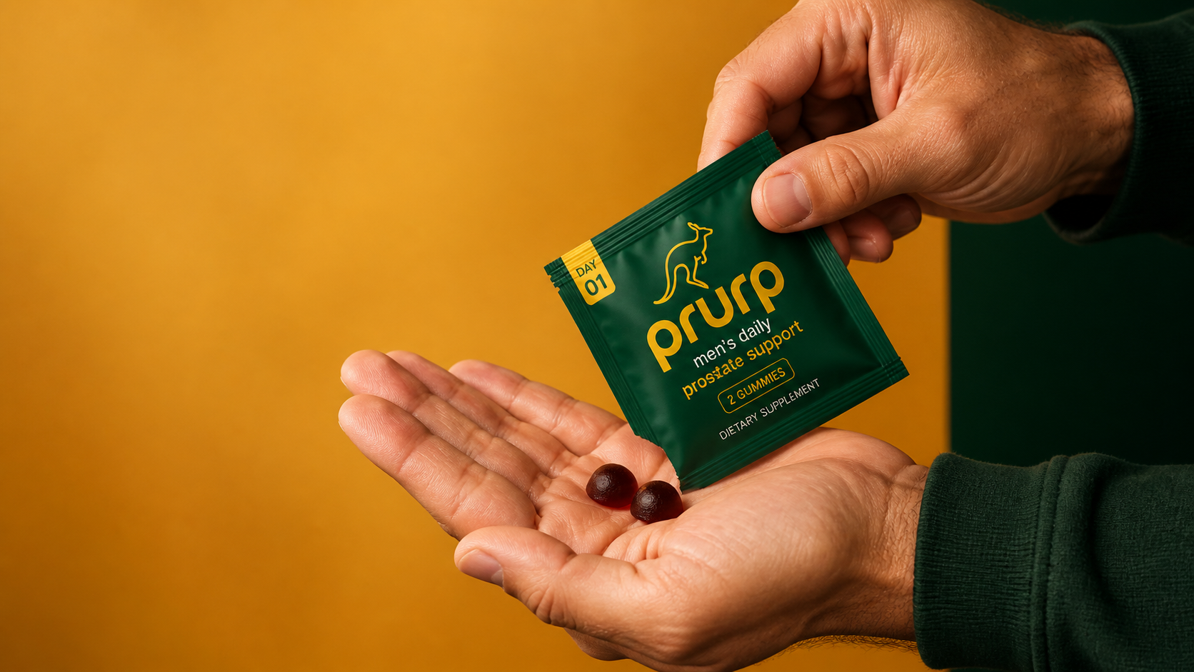 Hands opening a daily prurp sachet with two gummies
